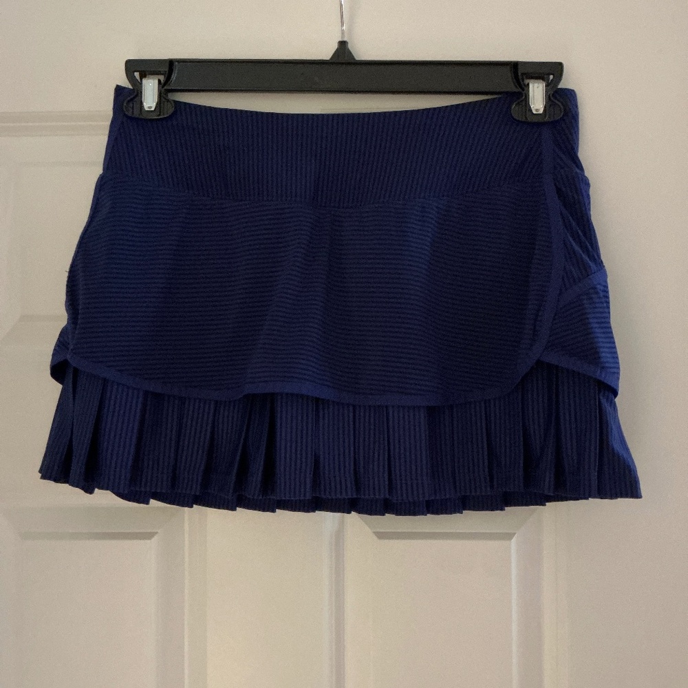 Athleta brand Skort, size small, color blue with darker blue pinstripes.